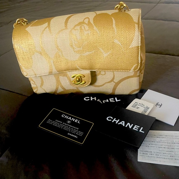 CHANEL Handbags - Vintage CHANEL rare GOLDen cream bag